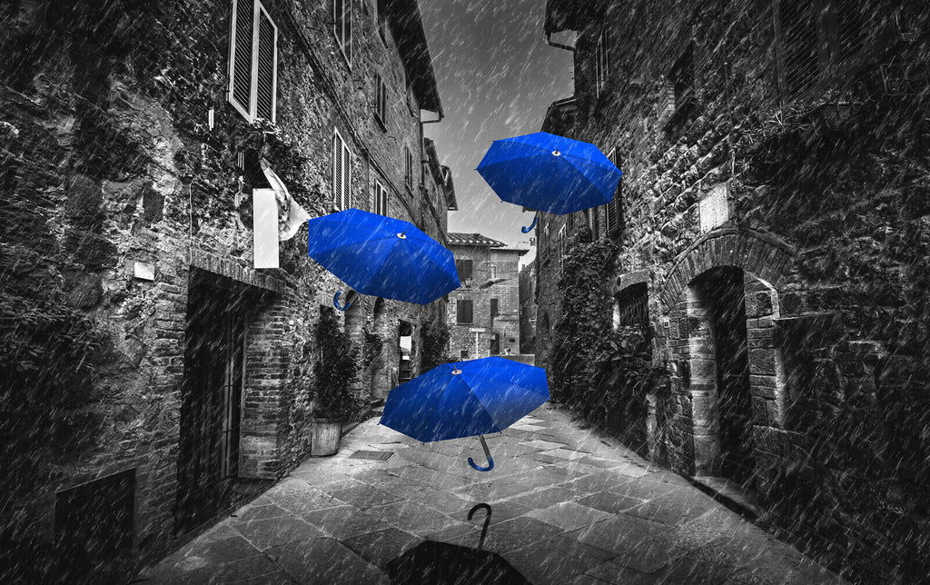 Flying black blue umbrellas in street in Tuscany Canvas Wall Art Picture Print